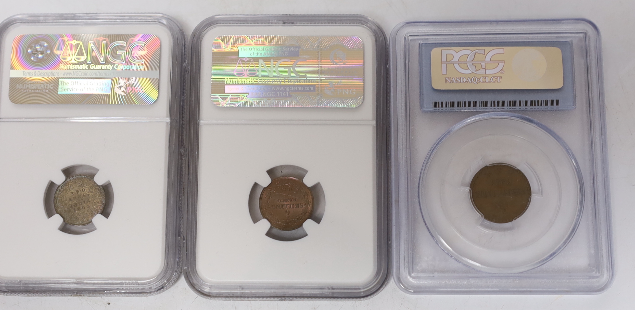 Russia One rouble 1893, ANACS graded VF 35, British India 2 Annas 1862 (C), NGC graded UNC, damage to obverse, Guatemala quarter real, 1819 G, NGC graded MS 65 (the highest graded example by NGC), Sweden 1/6 skilling 184